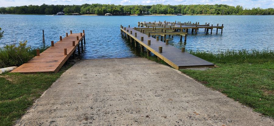 The new dock at Lot 10 beside the old launch dock and concrete boat ramp
